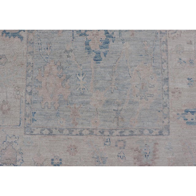 2020s Modern Tribal Oushak With a Cream Border and Light Gray-Blue Background 4'0 X 6'2 For Sale - Image 5 of 12