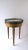 An Italian oak, marble, and brass side drinks table, in the Neoclassical design style, circa mid-20th century, 1960s,...