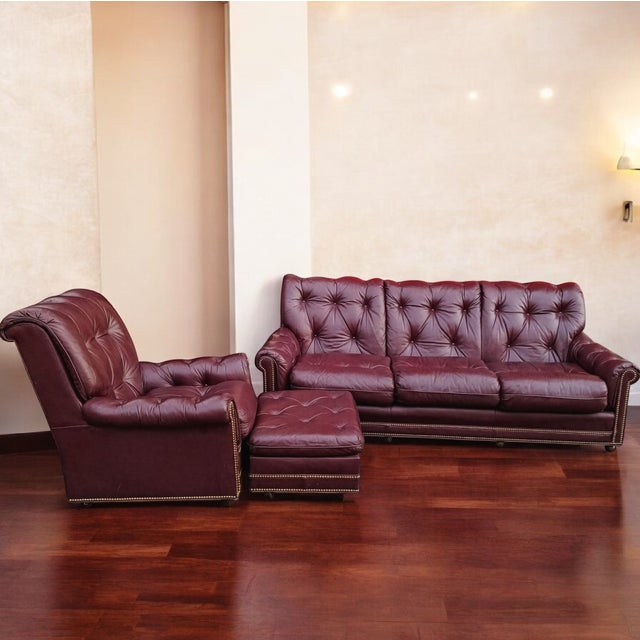 Elevate your home with this stunning, vintage Hancock & Moore living room collection, featuring a luxurious sofa,...