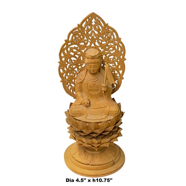 This is a wooden Kwan Yin Bodhisattva Buddha statue carved from sandalwood with original wood color. The lotus base...