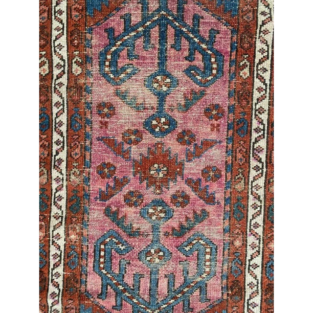 Very beautiful late 19th Century little rug with a tribal design and nice colors with red, purple and blue, entirely hand...