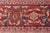 This antique, Sultanabad rug dates back to circa 1900 and is hand-knotted out of wool. Its color palette features navy,...