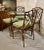This is an unusual set of 4 Chinese Chippendale cast aluminum side chairs in the Chinese Chippendale style together with a...