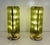 Elegant pair of table lamps produced in the early 2000s, featuring a sculptural design composed of curved transparent...