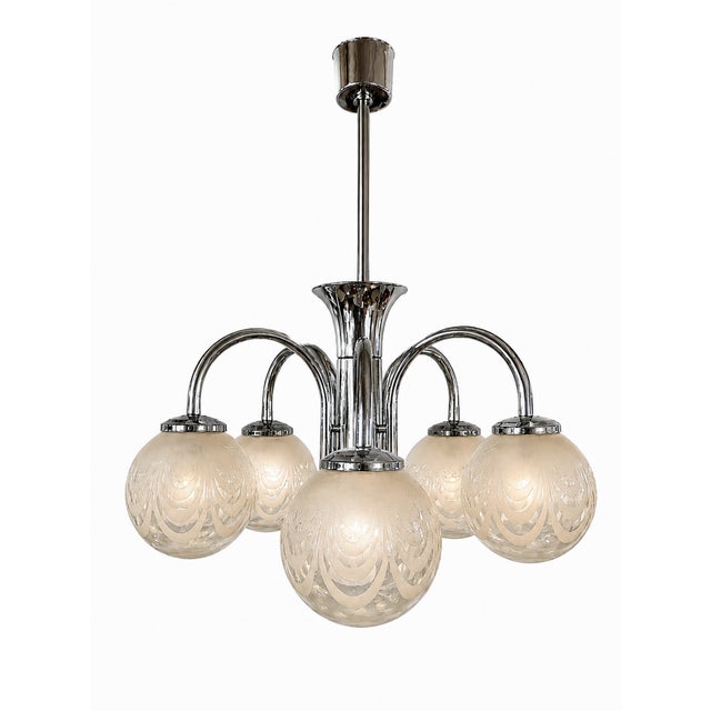 Art Deco Five-Light Chrome Chandelier with Etched Glass Globes, 1940s, in Very Good conditions. Designed 1920 to 1949 Up...