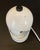 Metal lamp in very good condition, white in color. Only the base and the knob for rotating the diffuser are made of ABS...