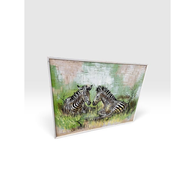 The artist combines finely rendered black-and-white zebras with a wonderfully textured, almost abstract background...