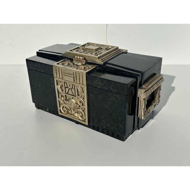 Maitland Smith attributed art deco style black granite decorative jewelry box with silver leaf carved detailing.
