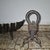 Wrought Iron Fireplace Andirons and Log Basket, Early 20th Century, Set of 3, in Good conditions. Designed 1890 to 1919