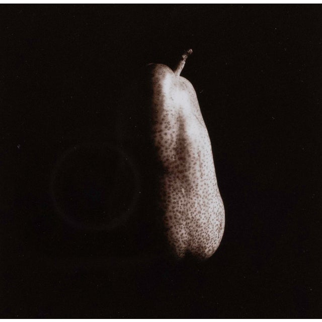 Unique silver sepia toned print. Image is 3.5" by 3.5" printed on an 8" by 10" sheet of cream paper. It is mounted in a...