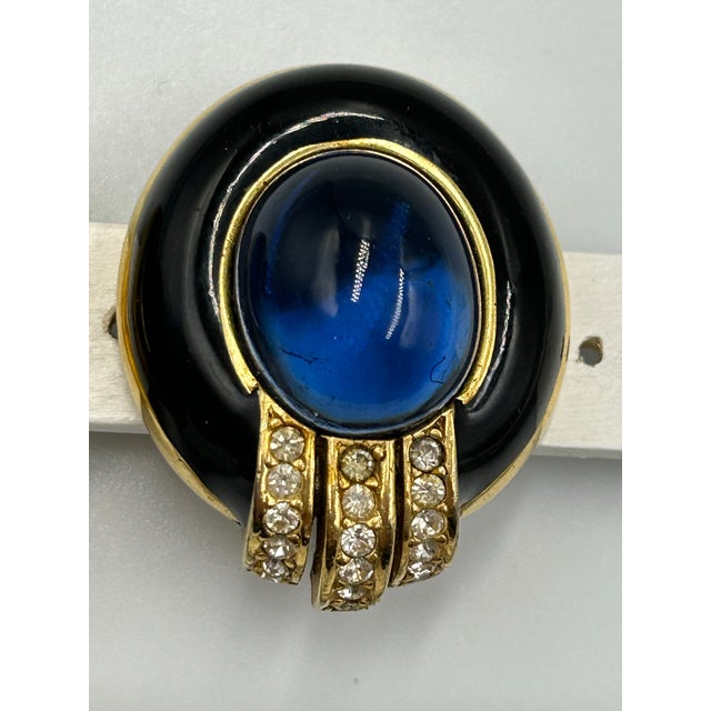 Ciner dreamy blue glass earrings in gold plated and enamel frame with clear rhinestone accents. From the 80s. They measure...