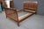 Ethan Allen bed from the American Impressions collection, featuring a warm cherry-toned finish and slatted spindle...