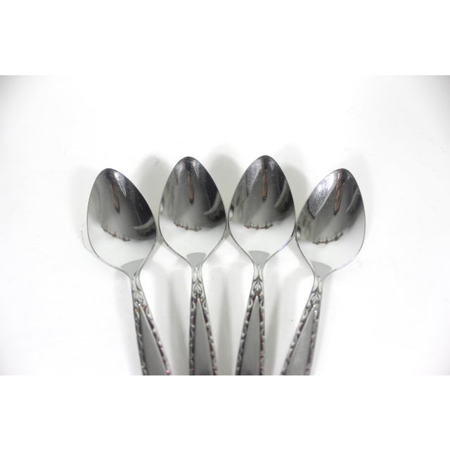 Matching set of 4 tea spoons stainless steel flatware from the sixties. This is the Venetia pattern by Oneida Community...
