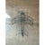 This vintage sculpture is hand-formed entirely from slender iron wire, capturing the silhouette of an early biplane with a...