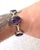 Lovely amethyst and sterling silver bracelet. Includes five oval shaped amethyst stones set in sterling silver. Inclusive...