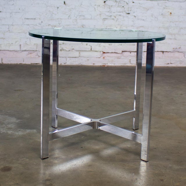 Mid to Late 20th Century MCM (Mid-Century Modern) to Modern end or side stable composed of a solid polished solid aluminum...