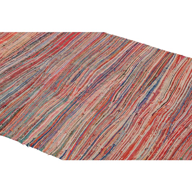 Handwoven in wool and originating from Morocco circa 1950-1960, this 4x7 vintage Moroccan Kilim rug is a rare piece like...