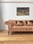 A beautifully English scrolling country house deep sofa upholstered in the most fabulous ticking stripe. Sadly in need of...
