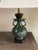 Hollywood Regency style beautiful and vintage bronze table lamps in the form of a Chinese archaic vase on a wood base....