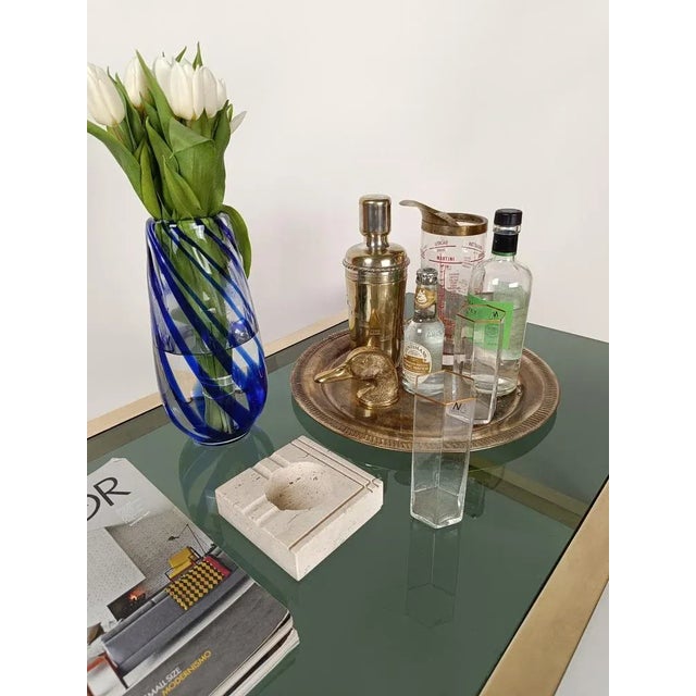 Sculptural Ashtray attributable to the historic company Fratelli Mannelli, specialized in the processing of travertine....