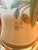 Large hand-painted lamp. Cream/tan background with flowers, grass and a butterfly. Does not come with a lampshade. This...