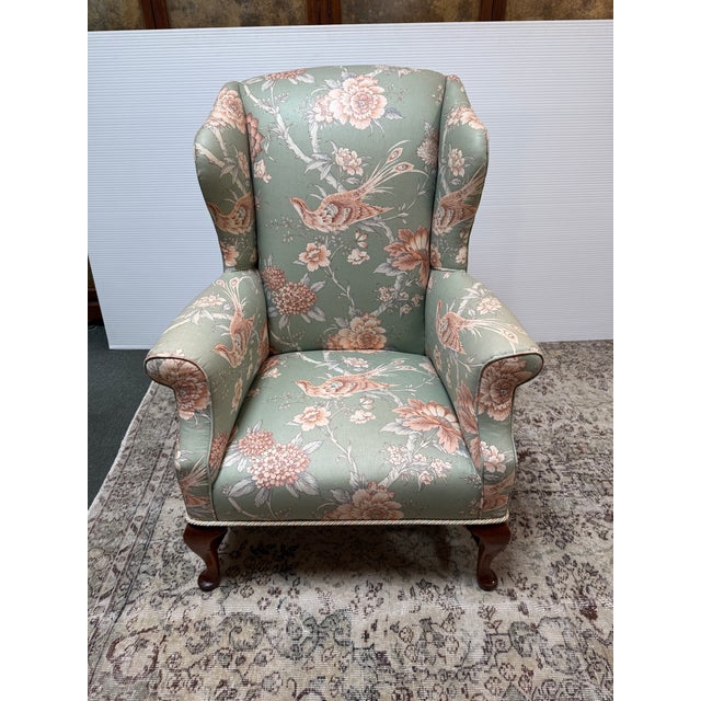 Design Plus Gallery presents a Wingback Chair with Schumacher Upholstery. The chair has a petite silhouette with tight...