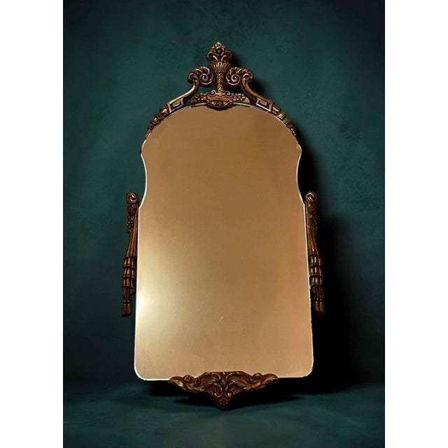 Stunning antique mirror that is stamped on the back of the mirror itself, 1932. I do not know if that is the age of the...