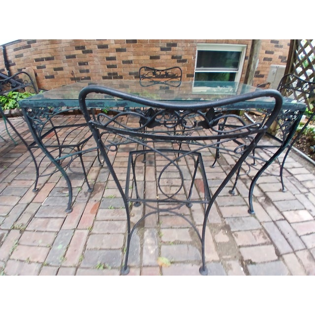 Vintage Salterini wrought iron table with glass top and 4 chairs. Ivy design. Ready for your restoration. Table 50 x 30....