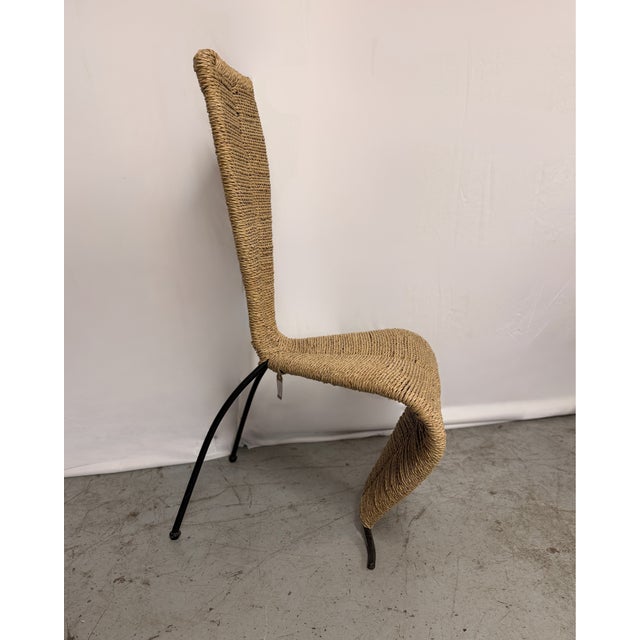 Amazing hourglass rope chair, designed after the 'S' chair from Tom Dixon in the 1980s. Chair is weaved with rushed rope...