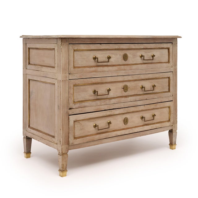 Chest of drawers from the Louis XVI period in France. This piece is made of solid wood construction, primarily mahogany....