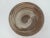 Japanese studio pottery tea bowl in brown glaze swirled with white at center. Incised artist mark at base, by Nitomi....