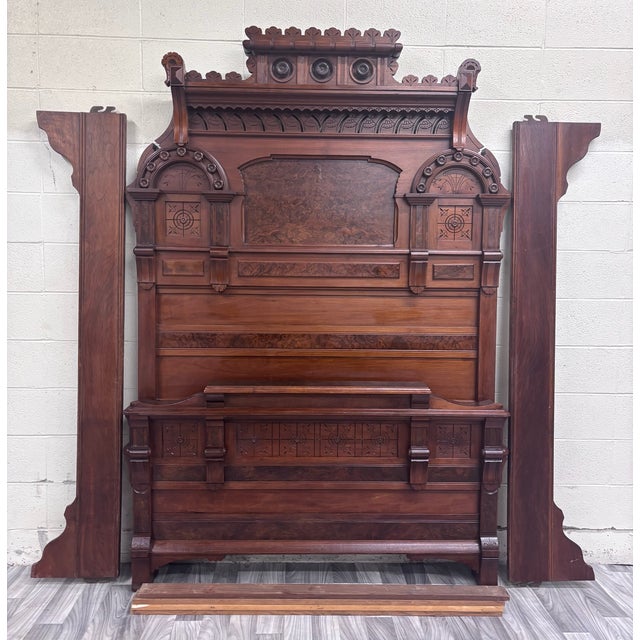 This is a magnificent antique full-size Victorian Eastlake Monumental high back bed, circa 1870–1890, featuring an...