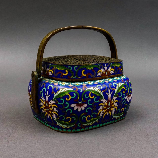Chinese Cloisonne Enameled Lotus Design Hand Warmer Measures approximately 5 1/4" long, 4 1/2" wide, 3 1/2" high, 5 1/2 to...