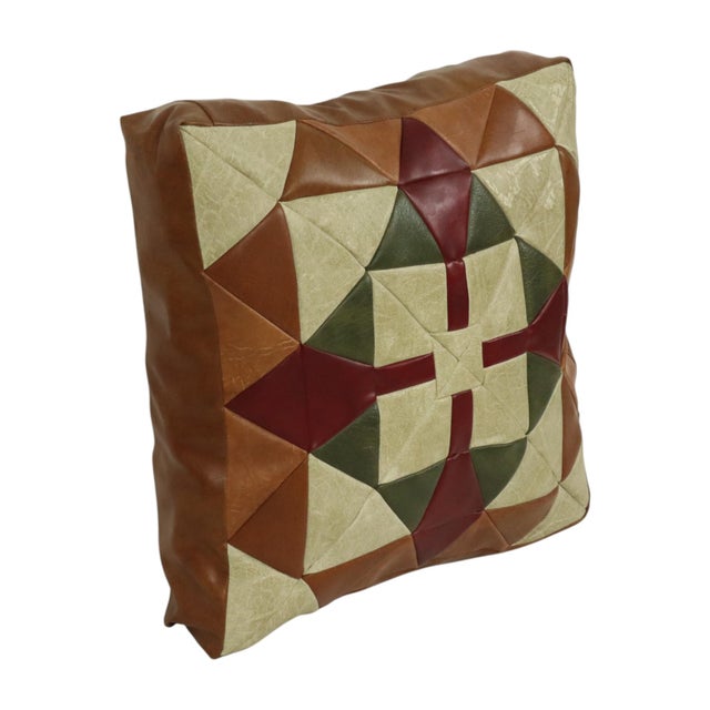 Vintage patchwork cushion with a diamond pattern, made from high-quality multicolored faux leather, circa 1960s-1970s....