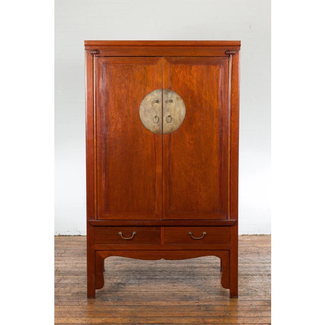 Asian Chinese Qing Dynasty Armoire with Brass Medallion and Reconfigured Pocket Doors For Sale - Image 3 of 13