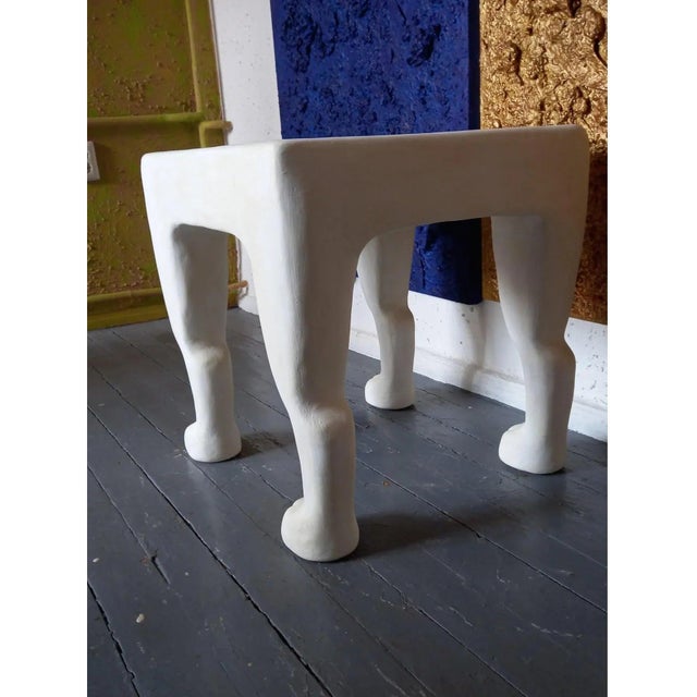 The four elegantly shaped legs give the piece a sense of movement and character, while the compact proportions make it...