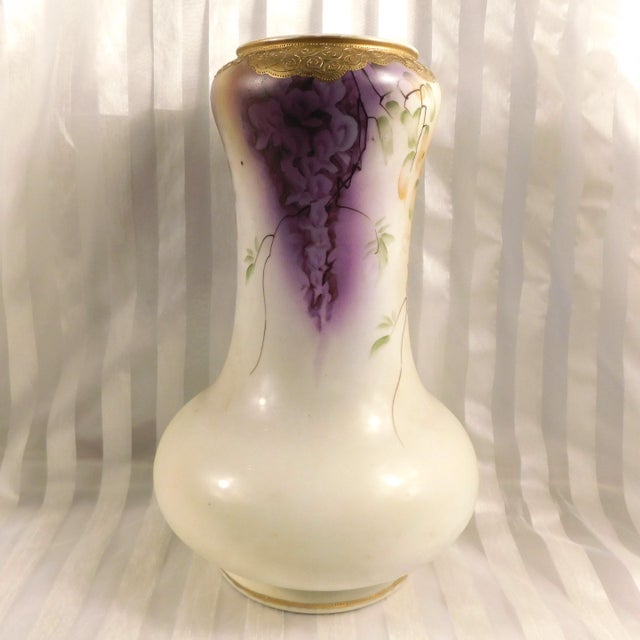 This is a rather large hand painted and hand decorated vase marked Imperial Nippon. The mark is shown. The vase is white...