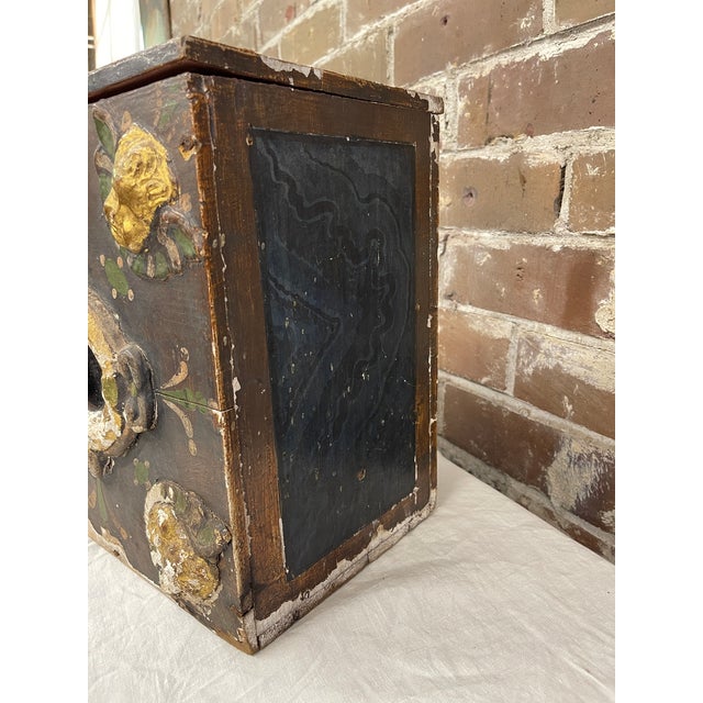 18th century Baroque painted giltwood Cherub box featuring four hand-carved giltwood cherub heads in each corner of the...