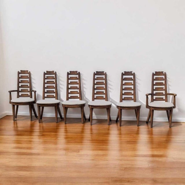 An elegant set of six Mid-Century Modern dining chairs, attributed to American Furniture Co., crafted from rich wood with...
