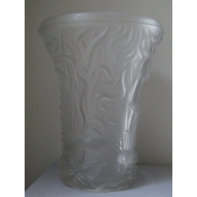 This Czech milk glass vase was designed by Josef Inwald for Barolac in the 1960s and features outlines of various species...