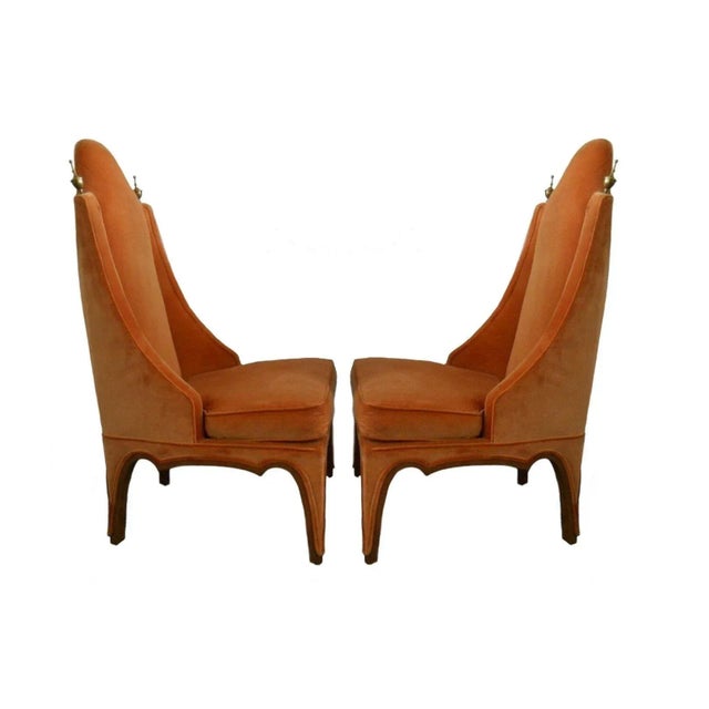 Unusually designed side or slipper chairs, American, 1960s. Newly upholstered in an orange velvet with the legs trimmed in...
