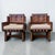 A strikingly stylish pair of French leather armchairs, dating to the 1930s or 1940s, combining superb craftsmanship with...