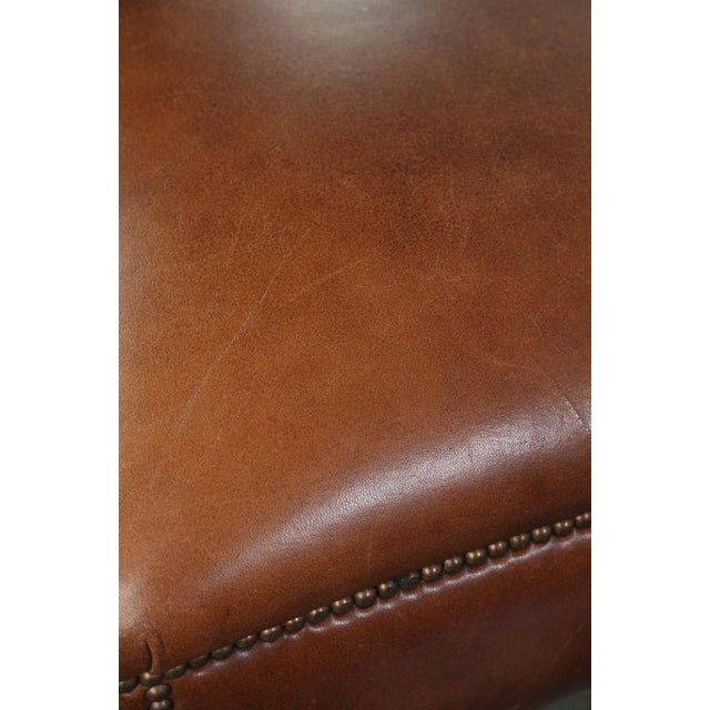 Animal Skin Cognac Cowhide Leather Ottoman with Decorative Nails For Sale - Image 7 of 10
