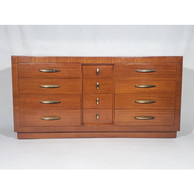 This dresser was my parents dresser, purchased some time in the 1950's. They took wonderful care of it and we were not...