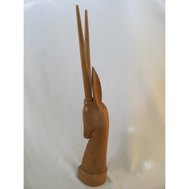 Carved Wood Gazelle Head Simple but elegant carving of the head of a gazelle. Antlers remove for shipping. Excellent...
