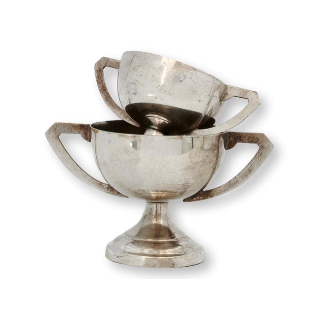 Pair of charming English silverplate children’s equestrian trophies dating to the late 1960s, engraved for pony club...