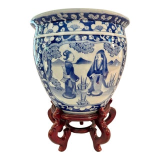 Circa 1900 Chinese Blue & White Prunus Figural Porcelain Jardinière With Wood Stand For Sale