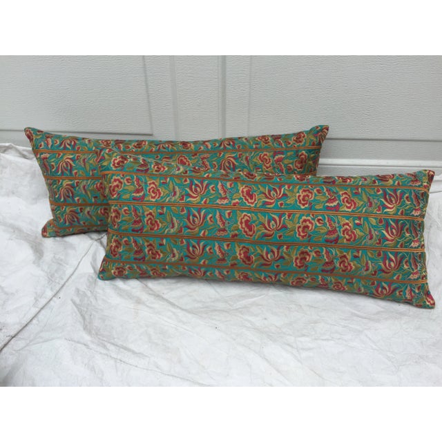 A pair of pillows made of a vintage colorful embroidered silk Asian textile fragment with birds and butterflies. New linen...