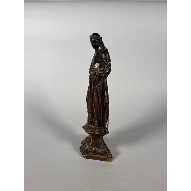 Saint Francis of Assisi, Italian work from the late 17th century, dark wood sculpture, Height 31 cm