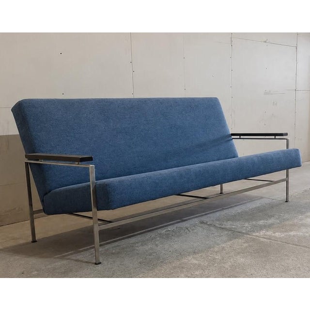 The "Liberty" sofa features a square stainless steel frame, which we have polished. It has two armrests made of Wenge...